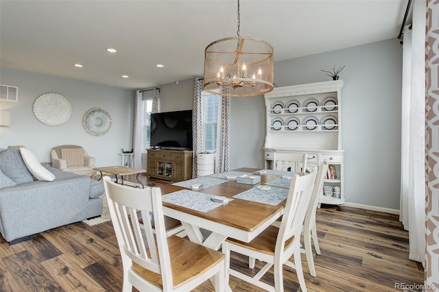 11038 Unity Ln, Commerce City, CO 80022 - dining space with a chandelier, wood finished floors, and recessed lighting
