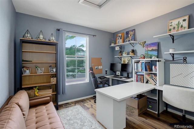 11038 Unity Ln, Commerce City, CO 80022 - office area with wood finished floors and baseboards
