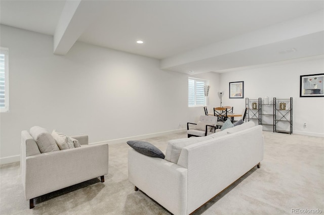 11038 Unity Ln, Commerce City, CO 80022 - living room with light colored carpet, beamed ceiling, and recessed lighting