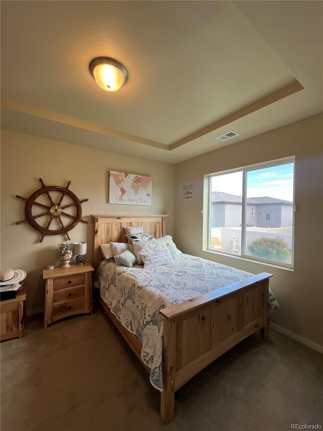 3892 Hackberry St, Wellington, CO 80549 - carpeted bedroom featuring a raised ceiling