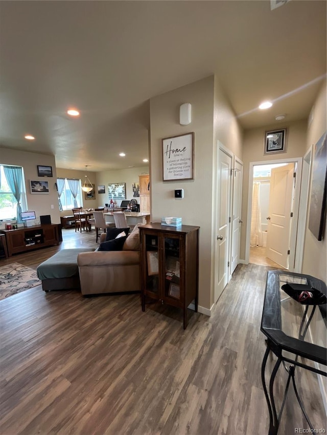 3892 Hackberry St, Wellington, CO 80549 - living room featuring wood finished floors and recessed lighting