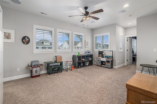 9380 Bear River St, Littleton, CO 80125 - living room featuring a ceiling fan, carpet flooring, baseboards, and recessed lighting