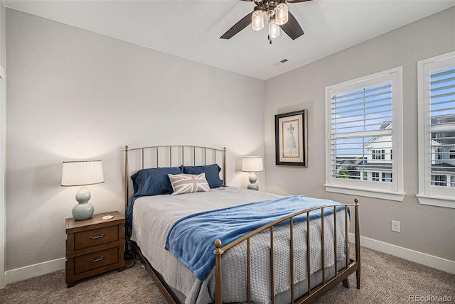9380 Bear River St, Littleton, CO 80125 - bedroom with carpet floors, baseboards, and a ceiling fan