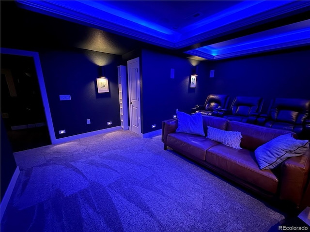 9380 Bear River St, Littleton, CO 80125 - cinema room featuring carpet floors, a tray ceiling, and baseboards