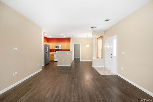 4064 S Carson St Unit 101, Aurora, CO 80014 - unfurnished living room featuring dark wood-style flooring and recessed lighting