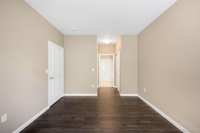 4064 S Carson St Unit 101, Aurora, CO 80014 - spare room with dark wood-style flooring