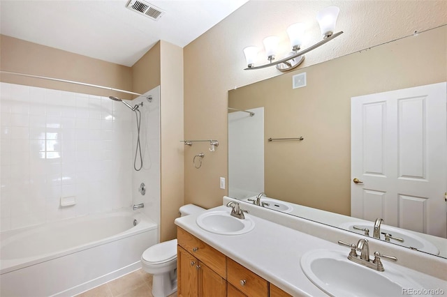 4064 S Carson St Unit 101, Aurora, CO 80014 - full bathroom with shower / bathtub combination, double vanity, and tile patterned floors