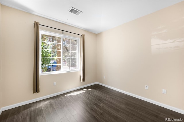 4064 S Carson St Unit 101, Aurora, CO 80014 - empty room with dark wood-type flooring and baseboards