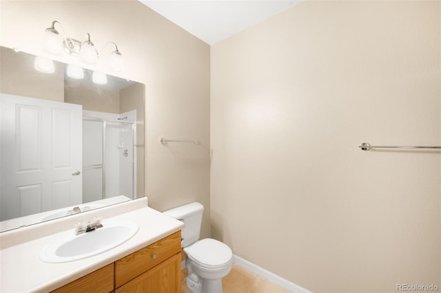 4064 S Carson St Unit 101, Aurora, CO 80014 - bathroom featuring vanity, an enclosed shower, and tile patterned flooring