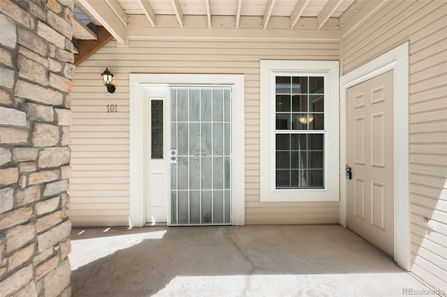 4064 S Carson St Unit 101, Aurora, CO 80014 - doorway to property featuring stone siding