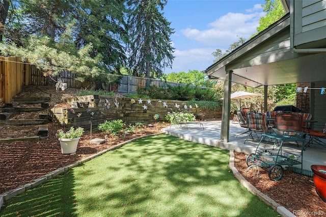 8002 Field Ct, Arvada, CO 80005 - fenced backyard with a patio