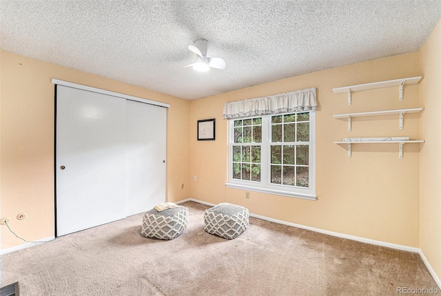 8002 Field Ct, Arvada, CO 80005 - unfurnished bedroom with a closet, carpet flooring, ceiling fan, and a textured ceiling