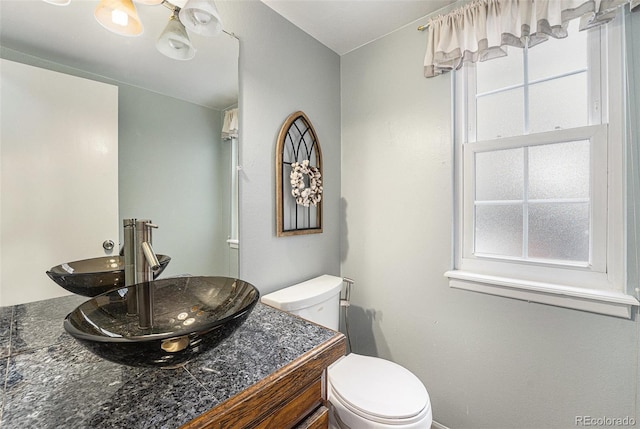 8002 Field Ct, Arvada, CO 80005 - half bathroom with toilet and vanity