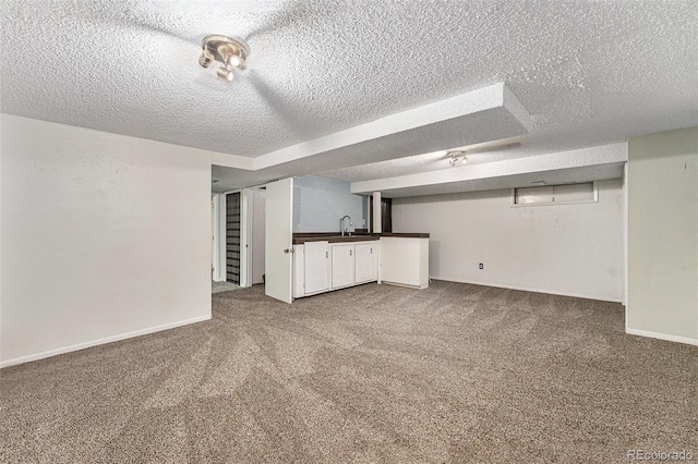 8002 Field Ct, Arvada, CO 80005 - finished basement with carpet and a textured ceiling