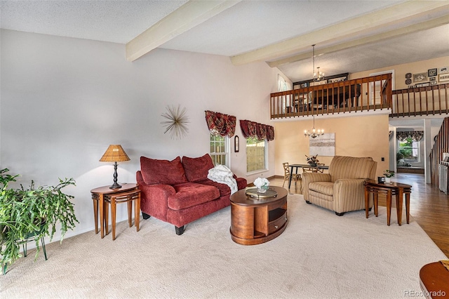 8002 Field Ct, Arvada, CO 80005 - carpeted living room with a chandelier and healthy amount of natural light