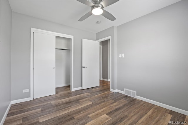 2582 S Uno Way, Denver, CO 80219 - unfurnished bedroom with wood finished floors, a closet, and a ceiling fan