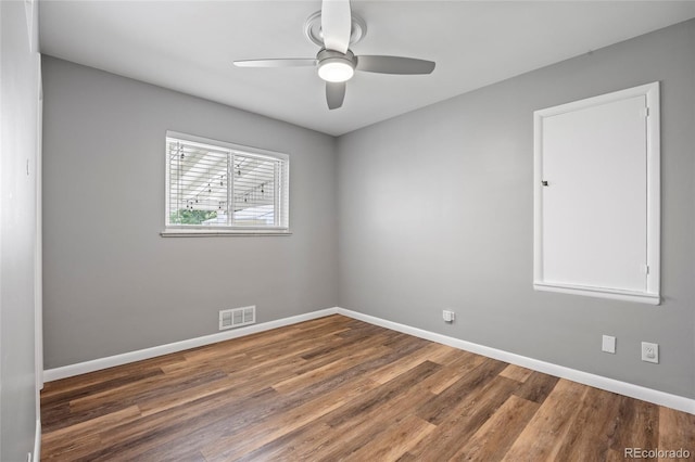 2582 S Uno Way, Denver, CO 80219 - unfurnished room with wood finished floors and ceiling fan
