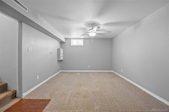 2582 S Uno Way, Denver, CO 80219 - below grade area featuring carpet, ceiling fan, and stairs