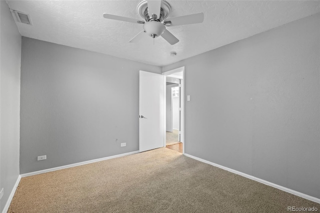 2582 S Uno Way, Denver, CO 80219 - unfurnished room with ceiling fan, carpet, a textured ceiling, and a smoke detector