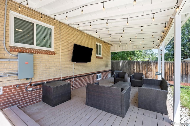 2582 S Uno Way, Denver, CO 80219 - wooden deck featuring outdoor lounge area