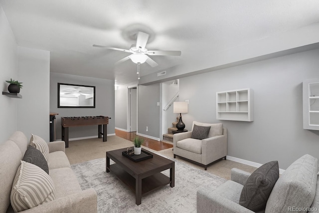 2582 S Uno Way, Denver, CO 80219 - living area featuring ceiling fan and light carpet