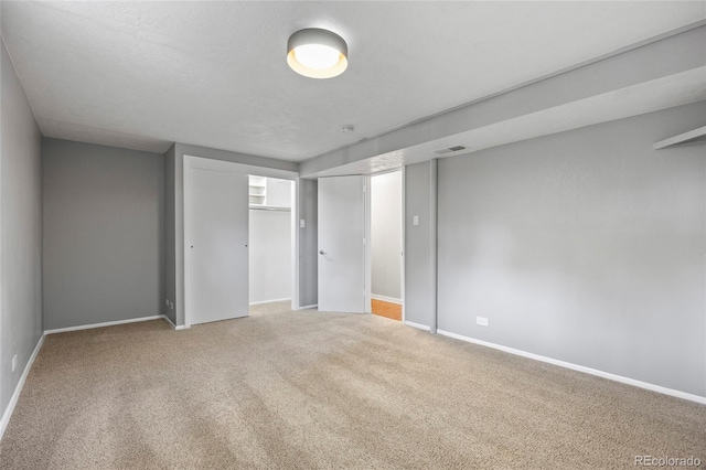 2582 S Uno Way, Denver, CO 80219 - unfurnished bedroom with carpet flooring