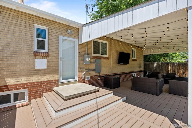 2582 S Uno Way, Denver, CO 80219 - wooden terrace with an outdoor hangout area