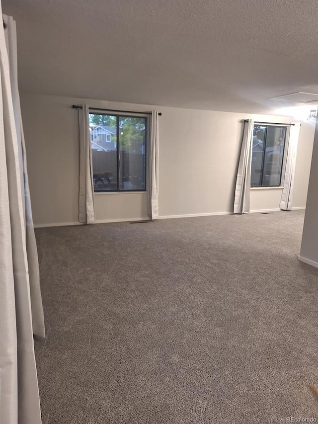 6207 W 92nd Pl, Westminster, CO 80031 - empty room featuring carpet and a textured ceiling