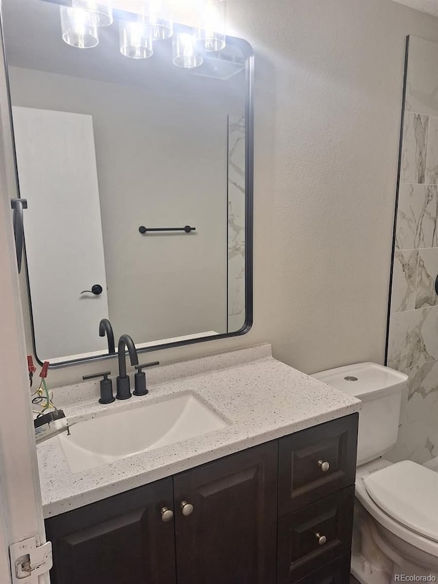6207 W 92nd Pl, Westminster, CO 80031 - bathroom with vanity and toilet