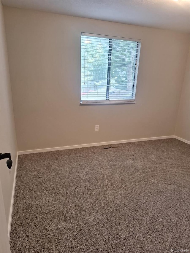 6207 W 92nd Pl, Westminster, CO 80031 - empty room featuring healthy amount of natural light and carpet