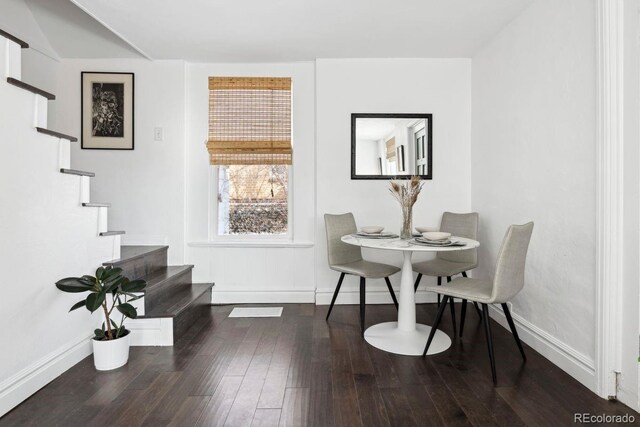 1535 Spruce St, Denver, CO 80220 - dining space featuring stairs, baseboards, and wood finished floors