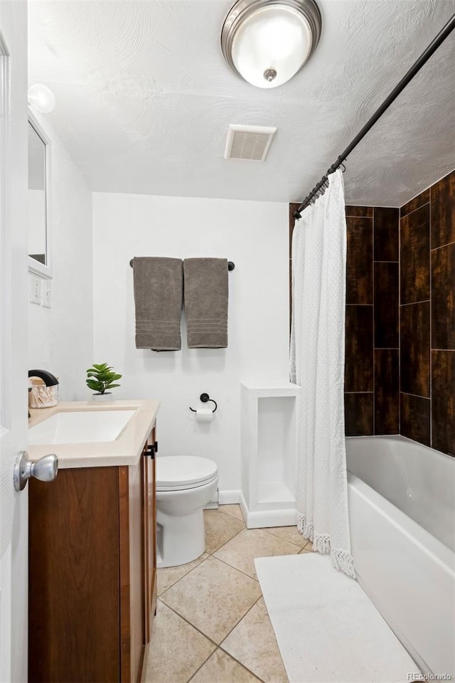full bathroom featuring visible vents, tile patterned flooring, vanity, toilet, and shower / bathtub combination with curtain