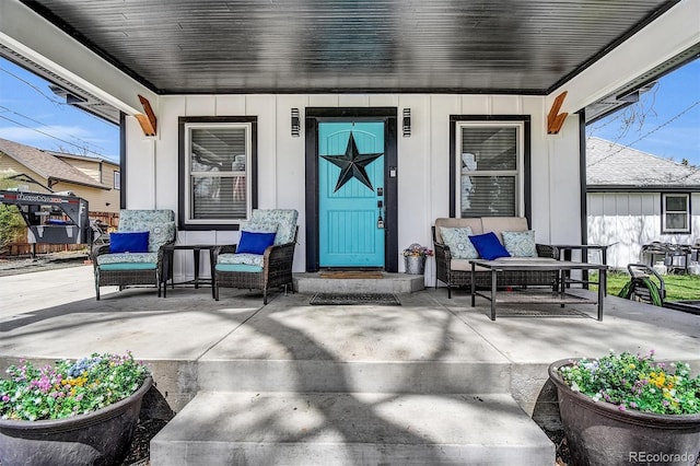 8885 W 64th Pl, Arvada, CO 80004 - entrance to property with a porch