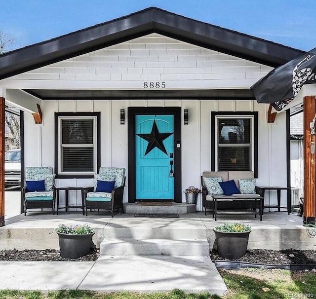 8885 W 64th Pl, Arvada, CO 80004 - property entrance featuring a porch
