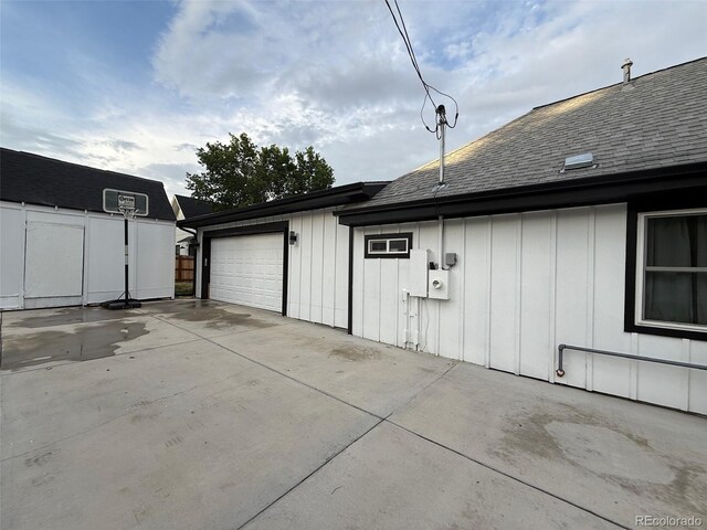 8885 W 64th Pl, Arvada, CO 80004 - garage with concrete driveway