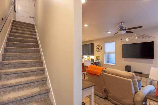 stairs with ceiling fan