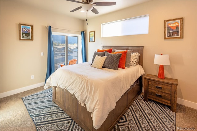 carpeted bedroom featuring access to exterior and ceiling fan