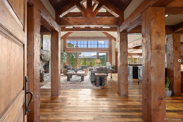 2929 Highlands View Rd, Evergreen, CO 80439 - entryway featuring hardwood / wood-style floors, plenty of natural light, and wood ceiling