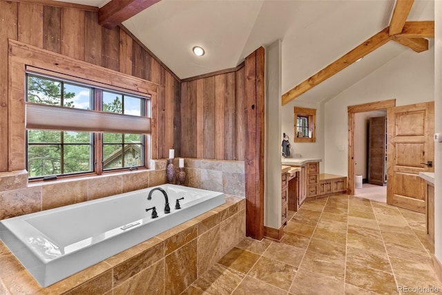 2929 Highlands View Rd, Evergreen, CO 80439 - bathroom featuring vanity, a garden tub, and stone finish flooring
