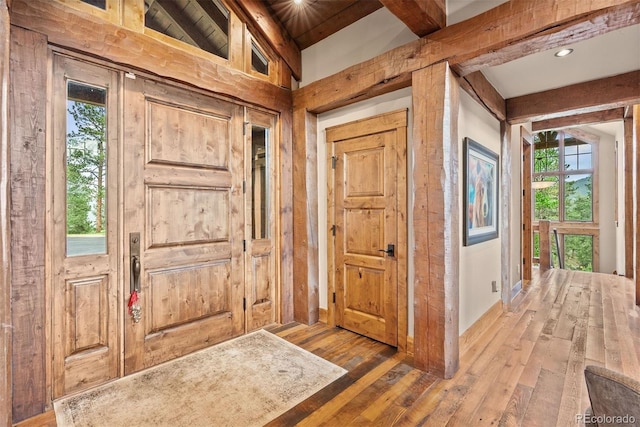 2929 Highlands View Rd, Evergreen, CO 80439 - entryway with plenty of natural light and hardwood / wood-style flooring