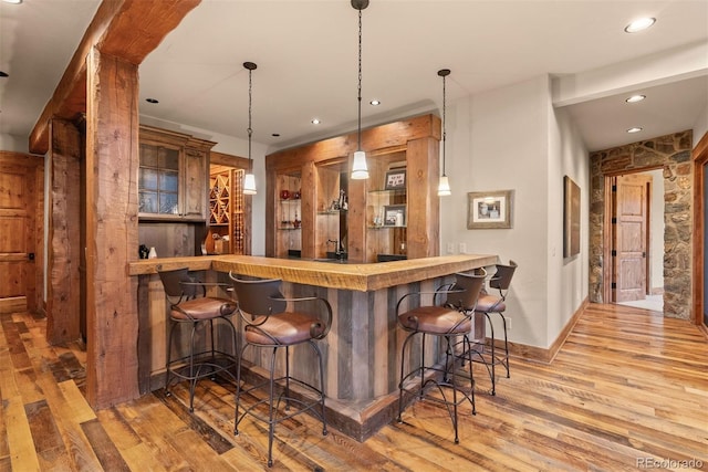 2929 Highlands View Rd, Evergreen, CO 80439 - indoor bar with wood finished floors, decorative light fixtures, and recessed lighting