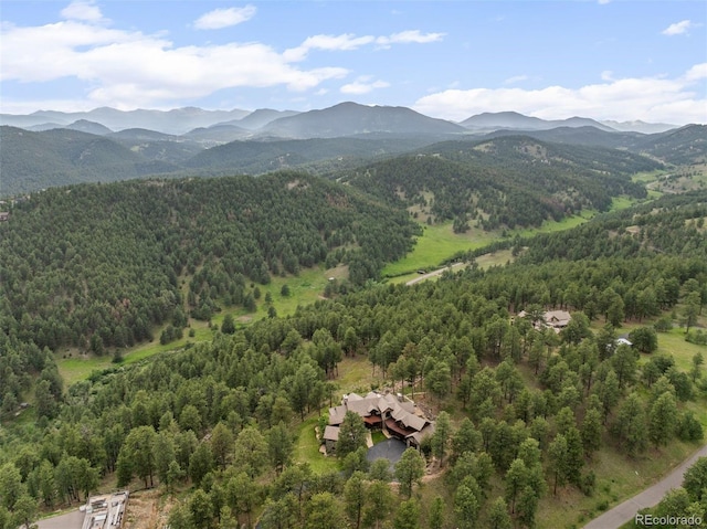 2929 Highlands View Rd, Evergreen, CO 80439 - view of mountain backdrop with a forest