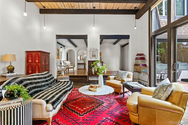 50 Albion St, Denver, CO 80220 - living room featuring a wood ceiling with exposed beams and a towering ceiling