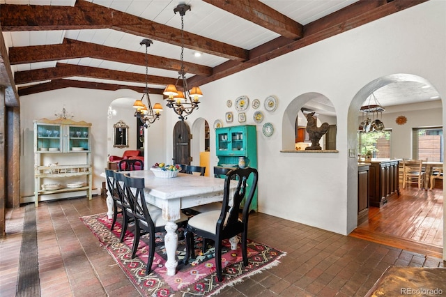 50 Albion St, Denver, CO 80220 - dining space featuring arched walkways and a chandelier