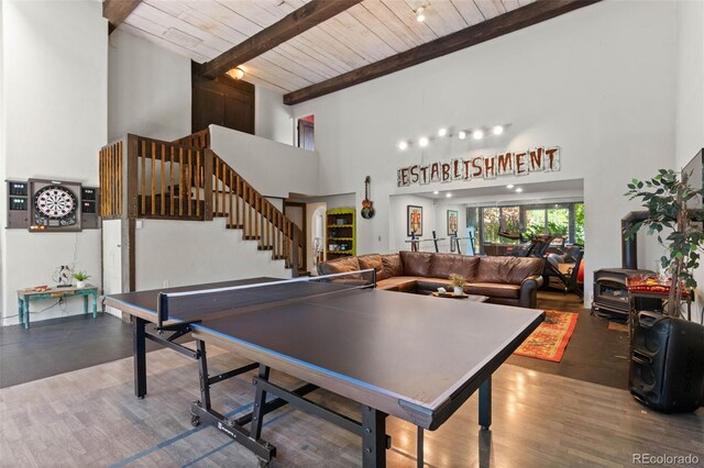 50 Albion St, Denver, CO 80220 - rec room with a high ceiling, a wood ceiling with exposed beams, and wood finished floors