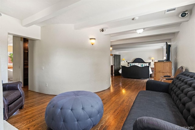 50 Albion St, Denver, CO 80220 - living room with beam ceiling and wood finished floors