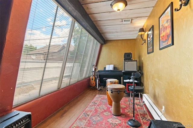 50 Albion St, Denver, CO 80220 - sunroom / solarium with a baseboard heating unit