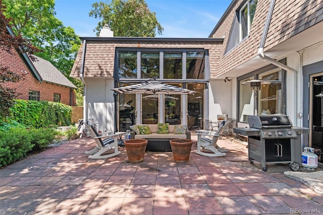 50 Albion St, Denver, CO 80220 - view of patio with a grill and an outdoor living space