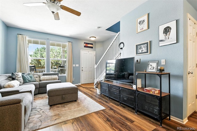 15612 E 96th Way Unit 20B, Commerce City, CO 80022 - living room with stairs, ceiling fan, and wood finished floors