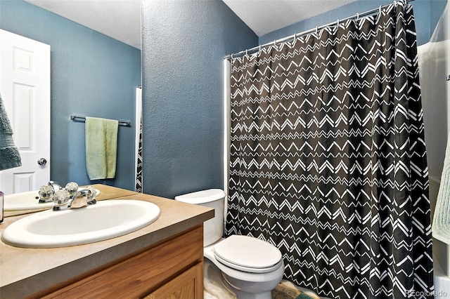 15612 E 96th Way Unit 20B, Commerce City, CO 80022 - full bath with vanity, a textured wall, and a shower with shower curtain